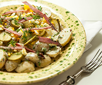 Potato and pastrami salad with dill and mustard