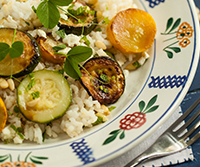 Rice salad with roasted courgette, pine nuts and mint